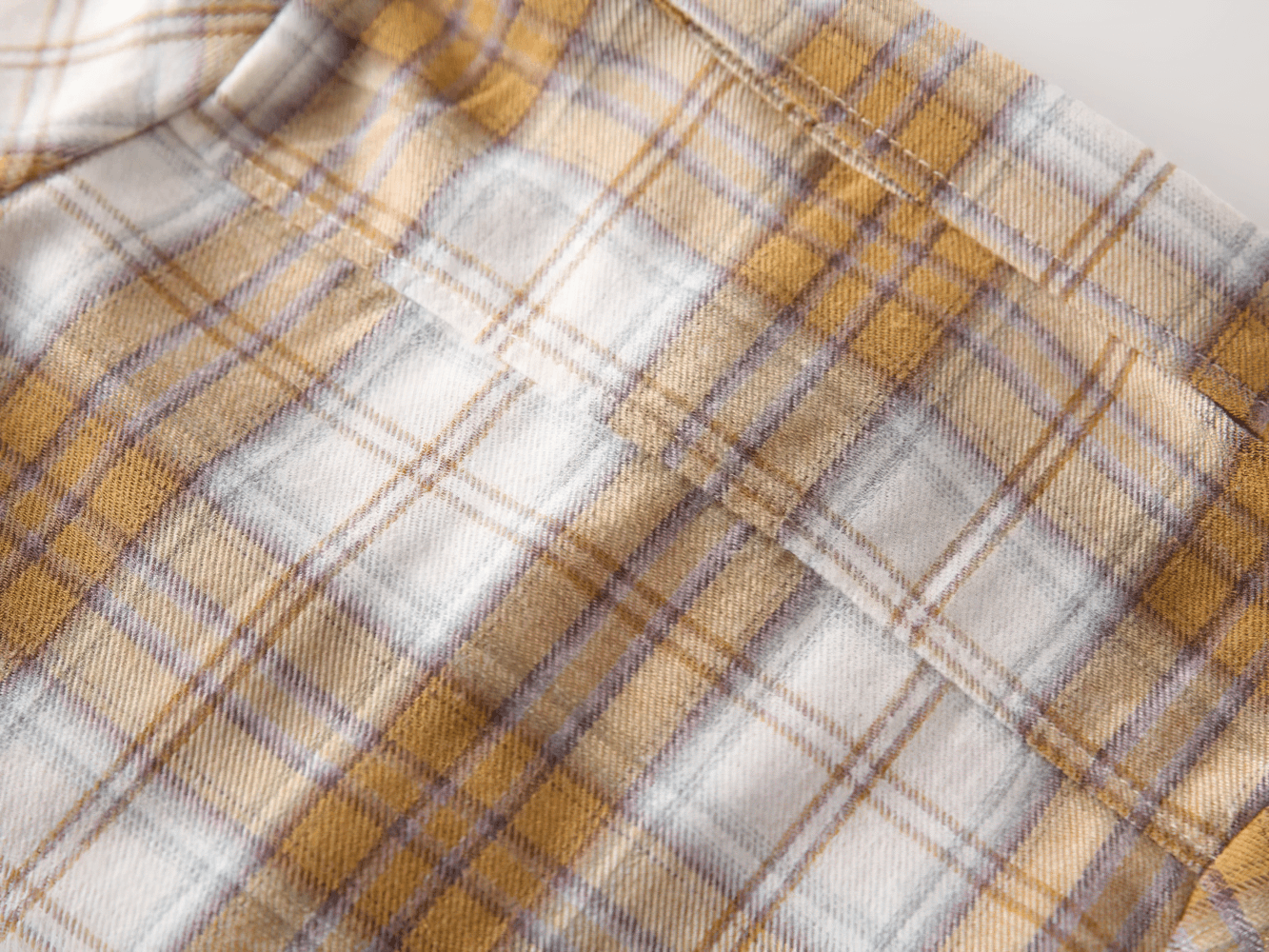 Close-up of soft flannel fabric of Plaid Long-Sleeved Toddler Boys Flannel Shirt - SF3521 showing its warm plaid design.